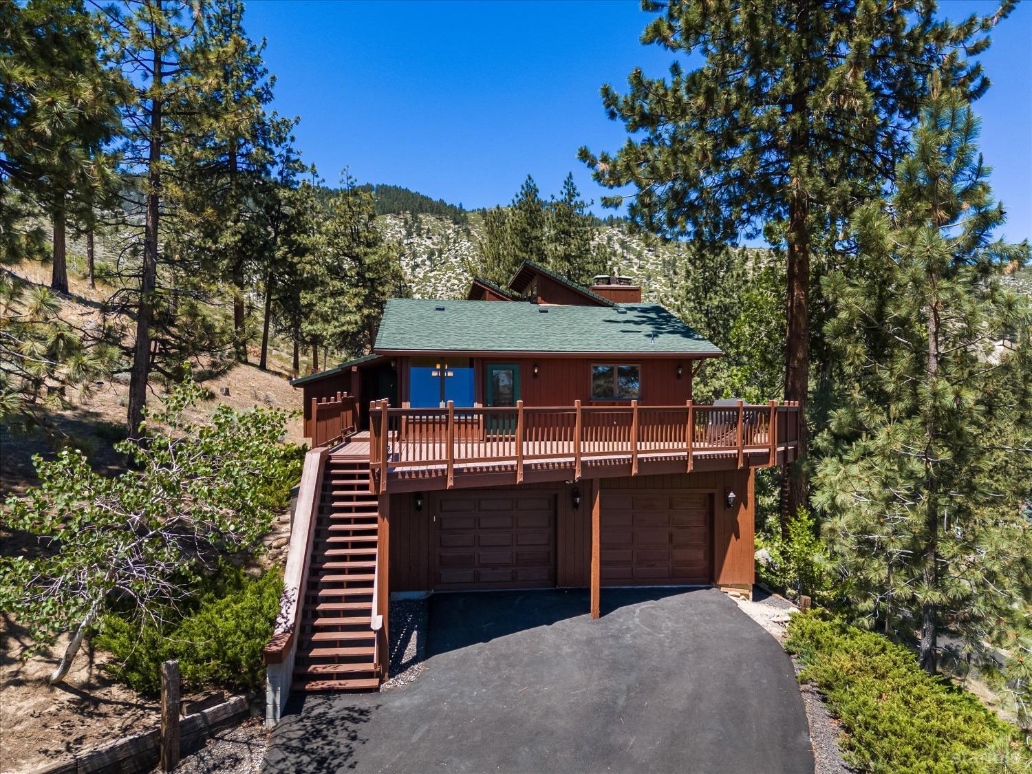 4201 Sandy Circle Carson City, NV 89703 - Photo 5 of 40 a front view of a house with a yard