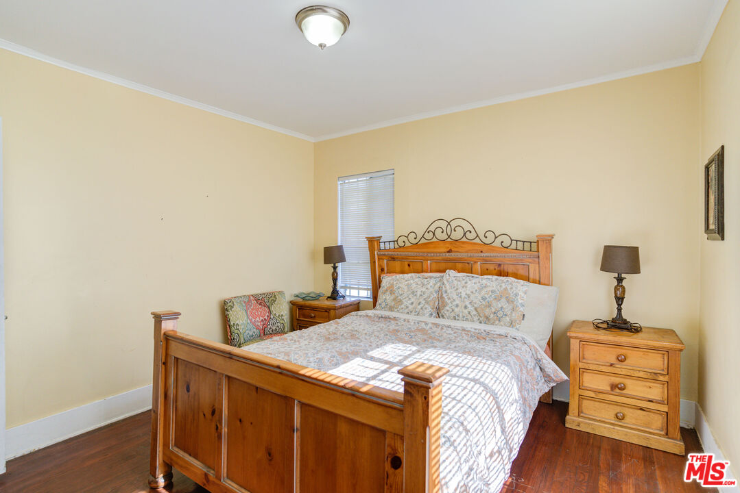 2404 Virginia Road Los Angeles, CA 90016 - Photo 12 of 21 a bedroom with a bed and a closet