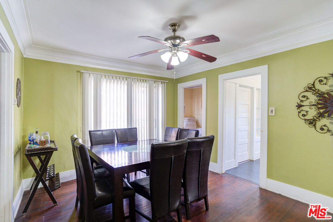 2404 Virginia Road Los Angeles, CA 90016 - Photo 7 of 21 a view of a dining room with furniture and a window