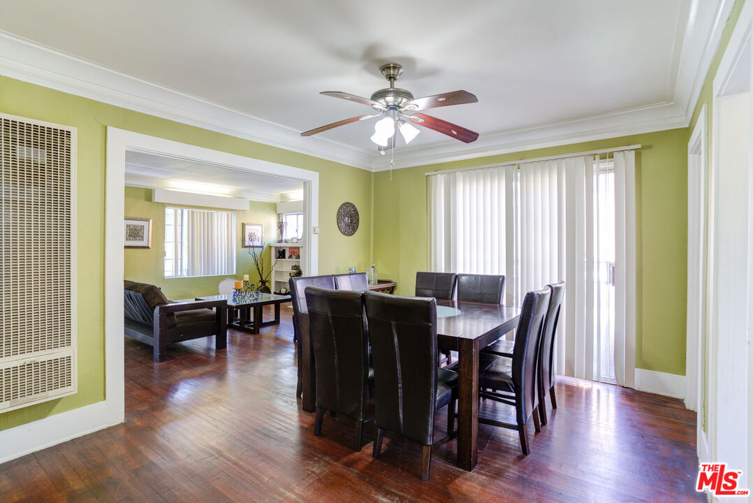 2404 Virginia Road Los Angeles, CA 90016 - Photo 8 of 21 a view of a dining room with furniture and wooden floor