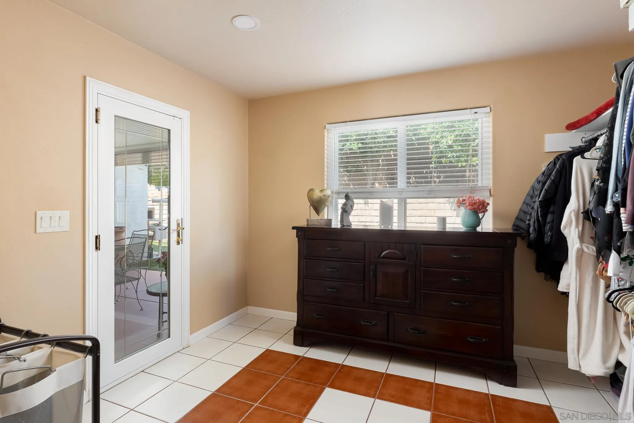 12822 Pinefield Road Poway, CA 92064 - Photo 14 of 23 a room with a dresser and a window