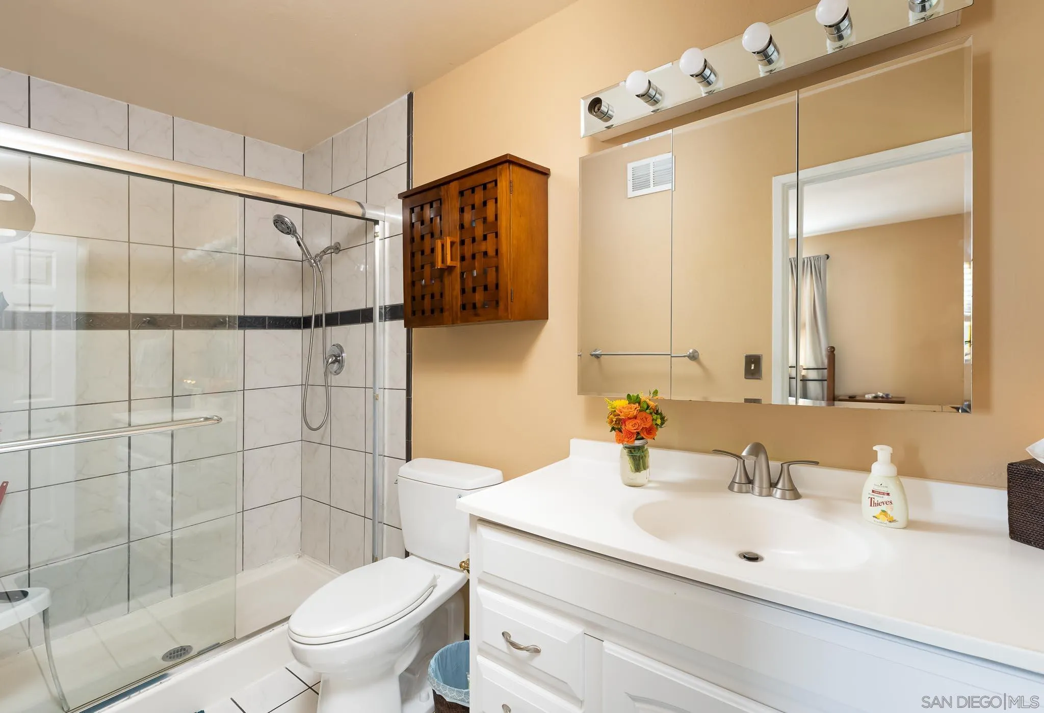 12822 Pinefield Road Poway, CA 92064 - Photo 15 of 23 a bathroom with a sink toilet and shower