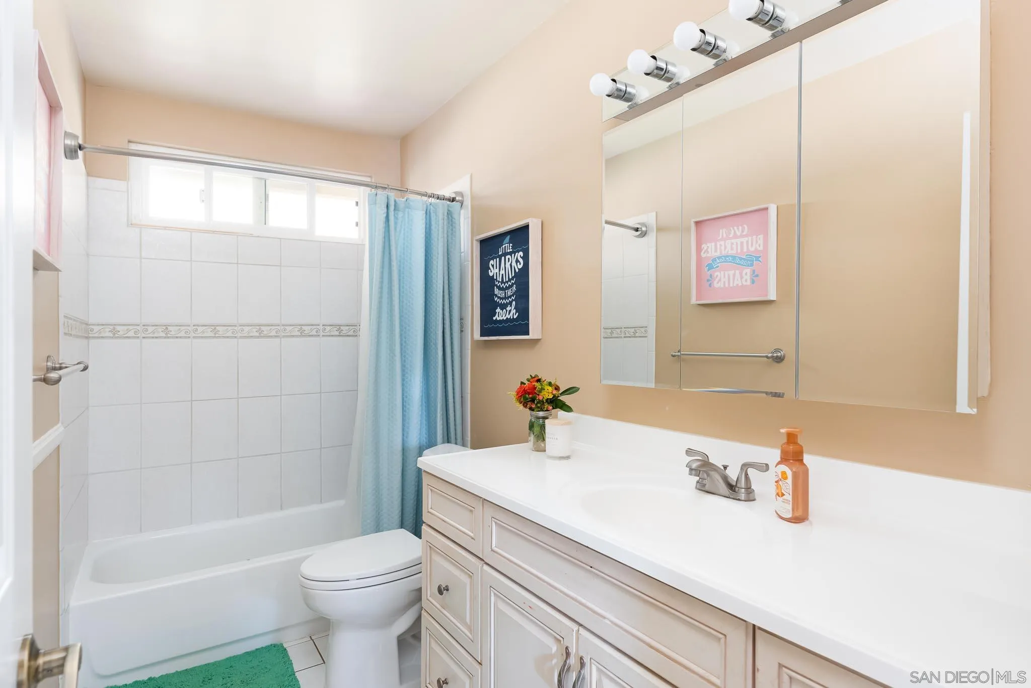 12822 Pinefield Road Poway, CA 92064 - Photo 17 of 23 a bathroom with a sink a toilet and shower