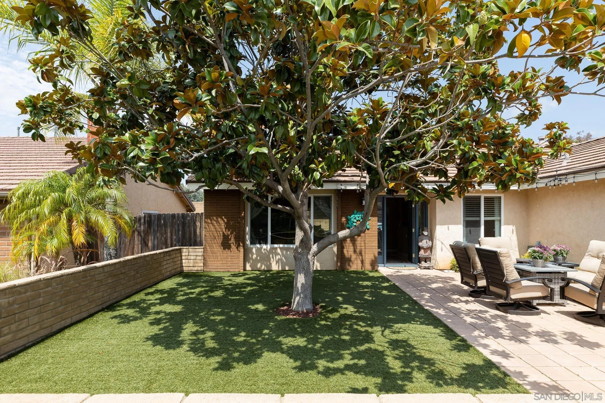 12822 Pinefield Road Poway, CA 92064 - Photo 3 of 23 a front view of a house with garden