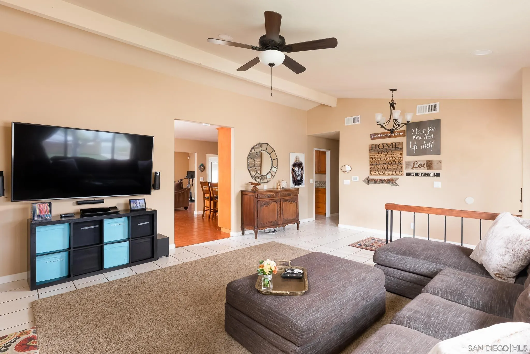 12822 Pinefield Road Poway, CA 92064 - Photo 6 of 23 a living room with furniture and a flat screen tv