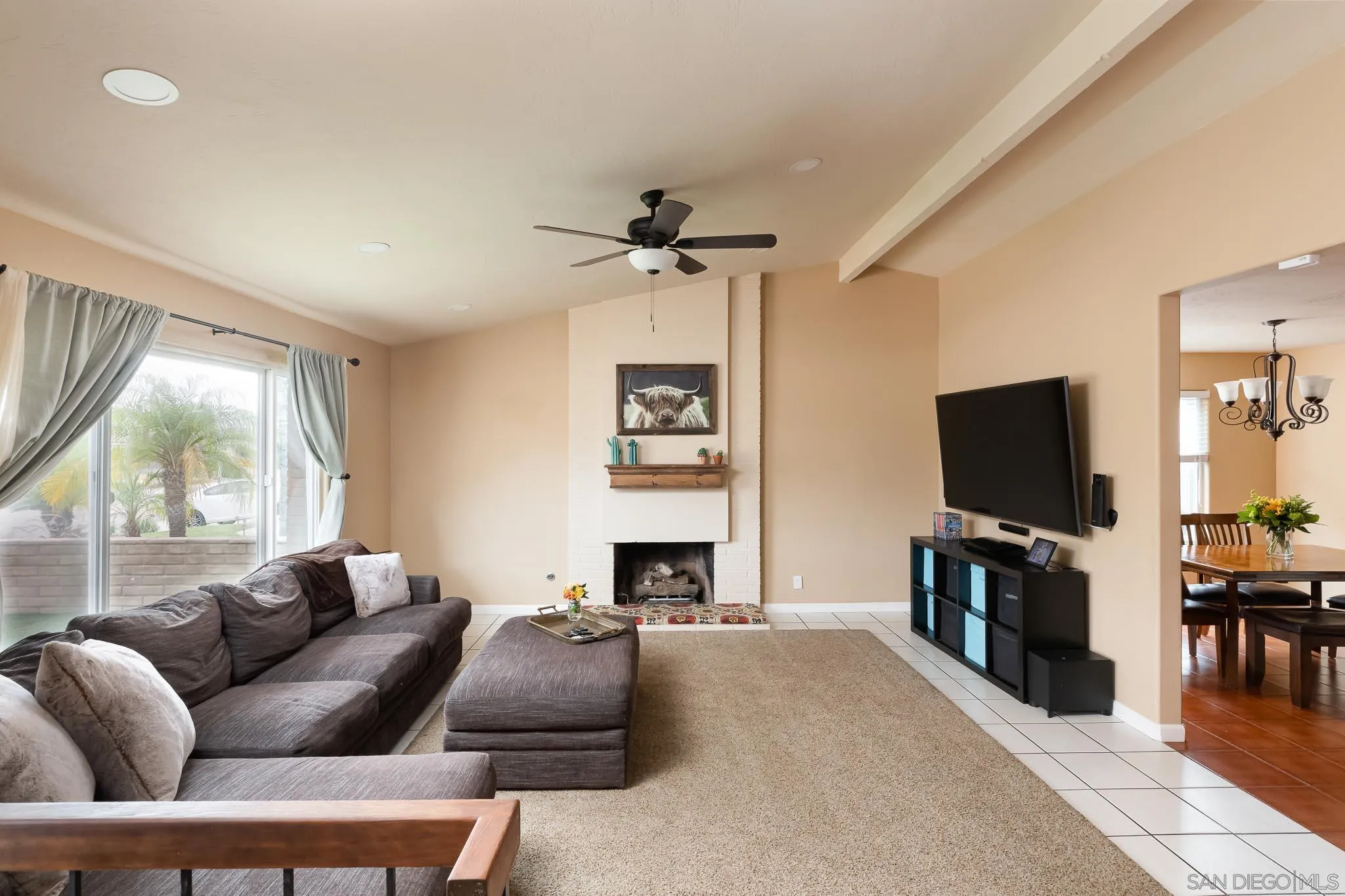 12822 Pinefield Road Poway, CA 92064 - Photo 7 of 23 a living room with furniture and a flat screen tv