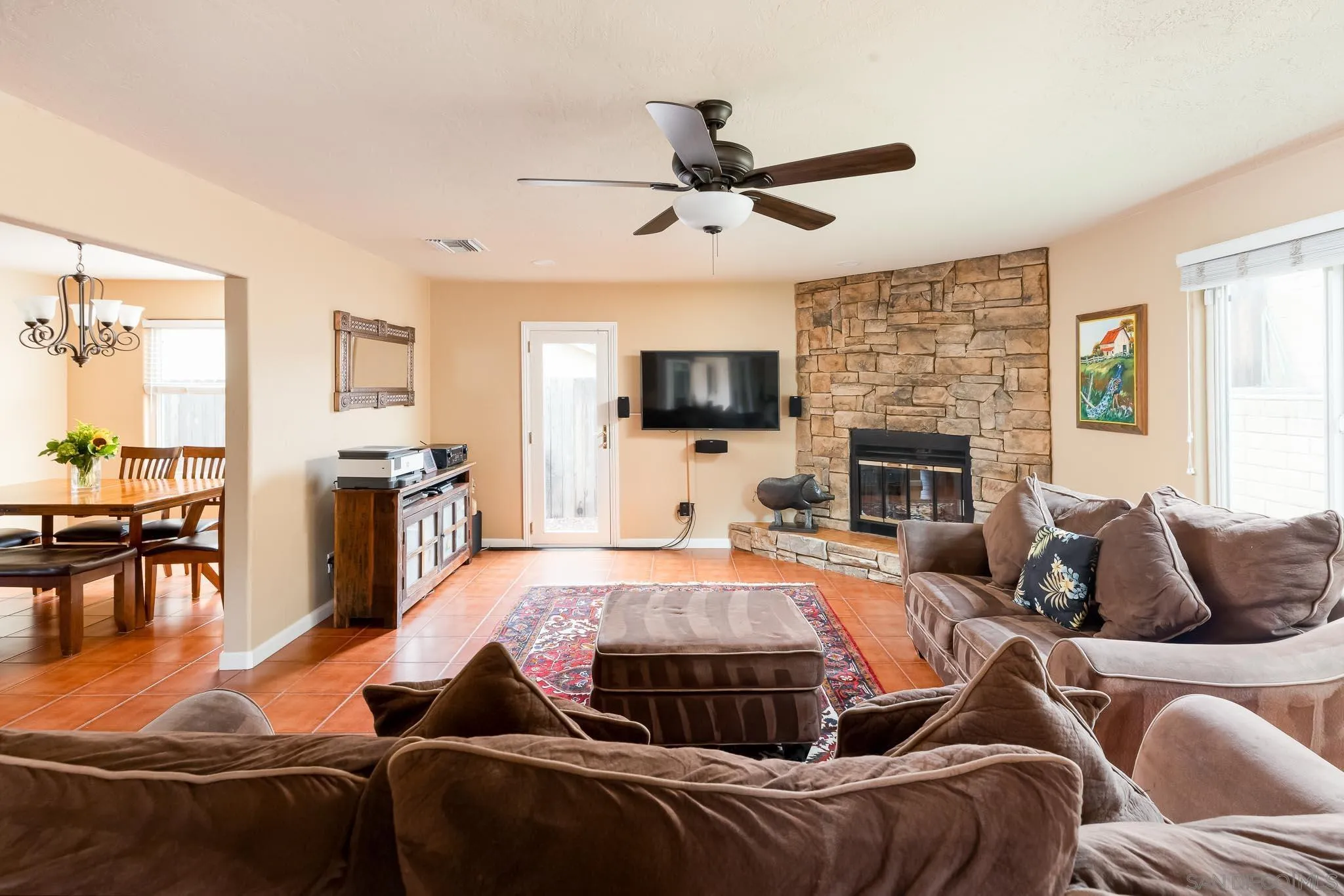 12822 Pinefield Road Poway, CA 92064 - Photo 9 of 23 a spacious bedroom with a bed and a fireplace