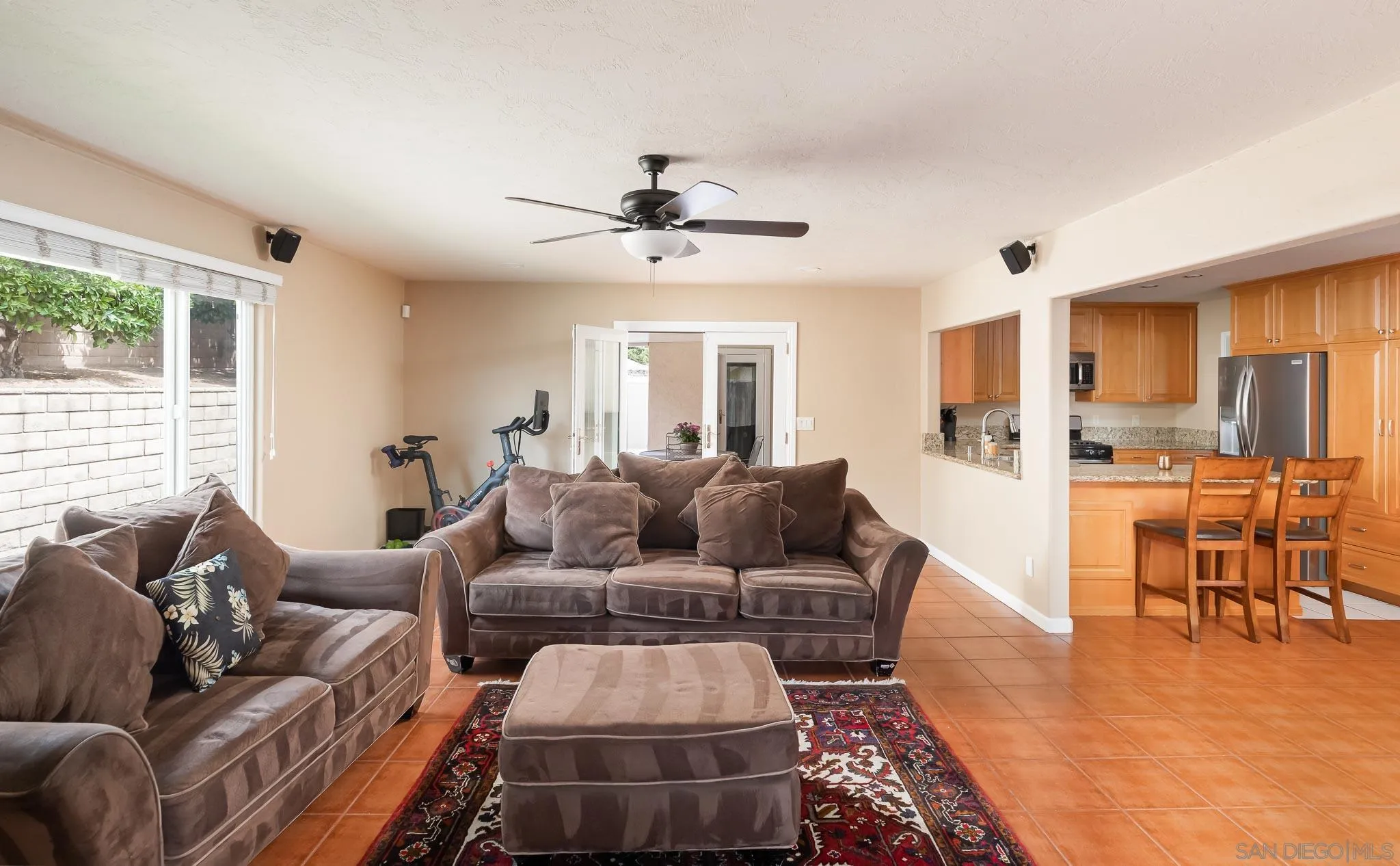 12822 Pinefield Road Poway, CA 92064 - Photo 10 of 23 a living room with furniture and a large window