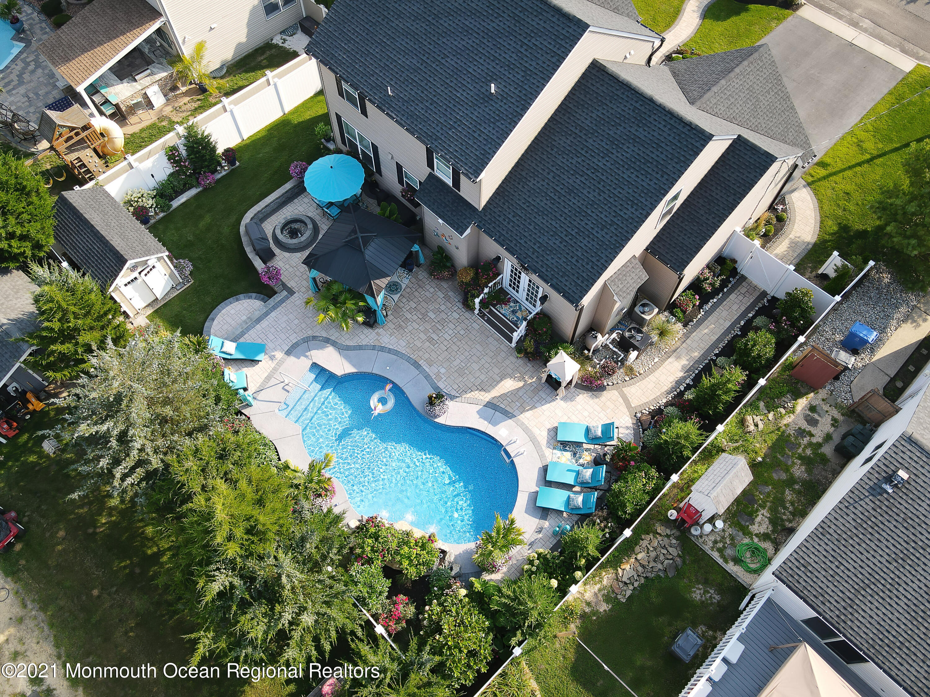 241 Privateer Road Manahawkin, NJ 08050 - Photo 15 of 44 an aerial view of a house with garden space and street view