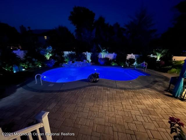 241 Privateer Road Manahawkin, NJ 08050 - Photo 3 of 44 a view of a yard with lots of lights