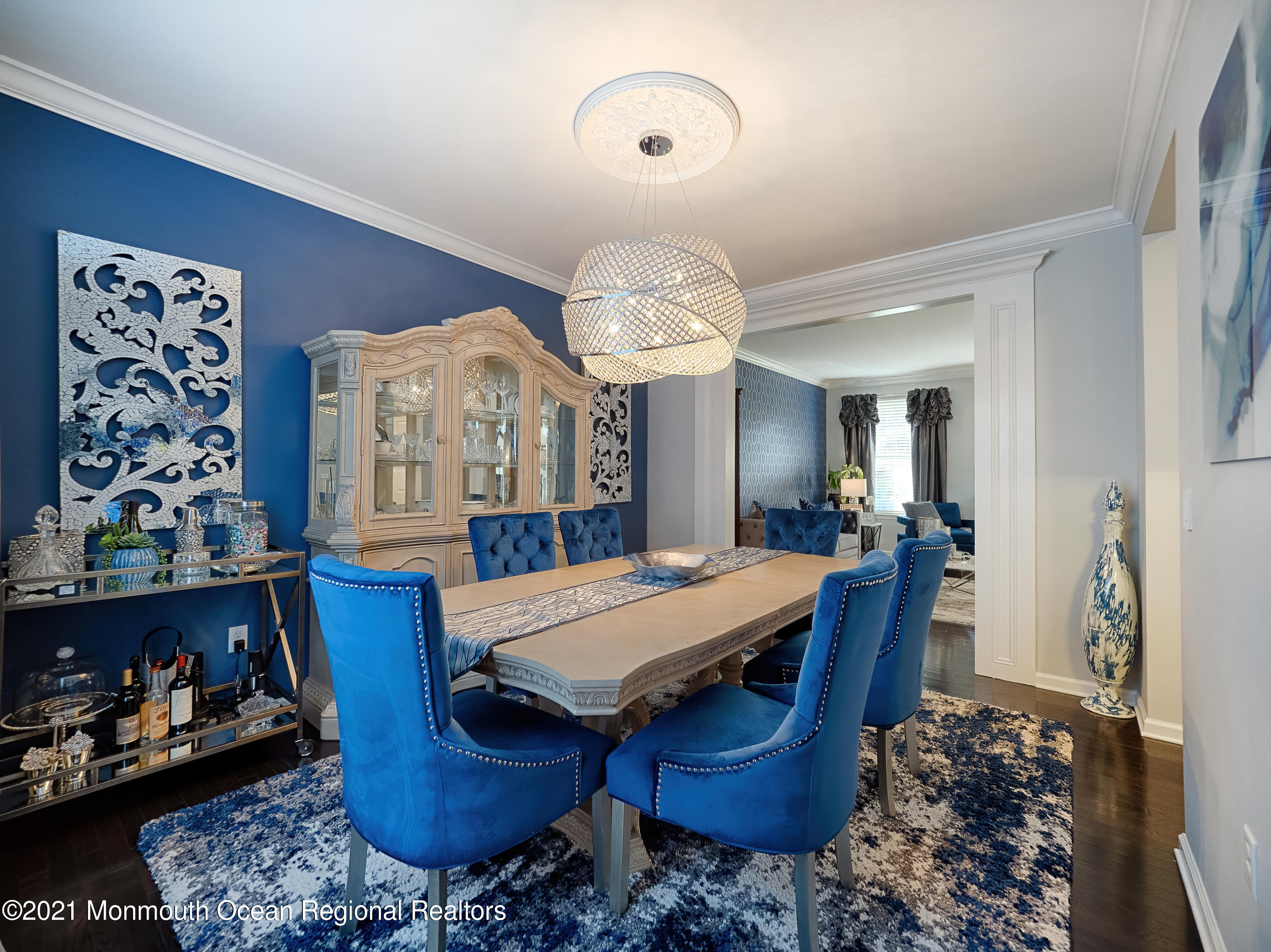 241 Privateer Road Manahawkin, NJ 08050 - Photo 30 of 44 a view of a dining room with furniture and chandelier