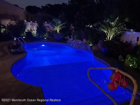 241 Privateer Road Manahawkin, NJ 08050 - Photo 4 of 44 a view of swimming pool with outdoor seating