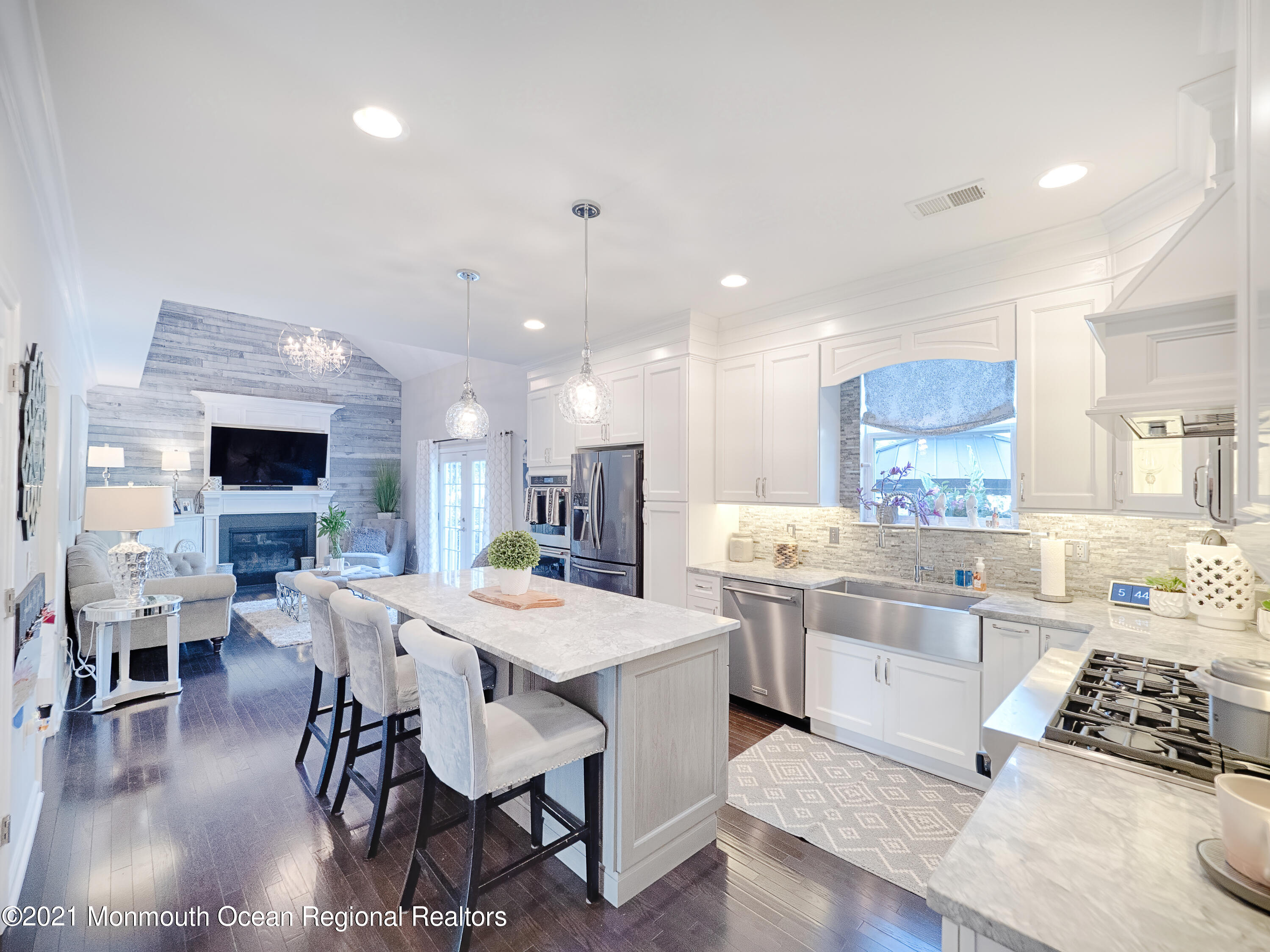 241 Privateer Road Manahawkin, NJ 08050 - Photo 40 of 44 a large kitchen with a table and chairs