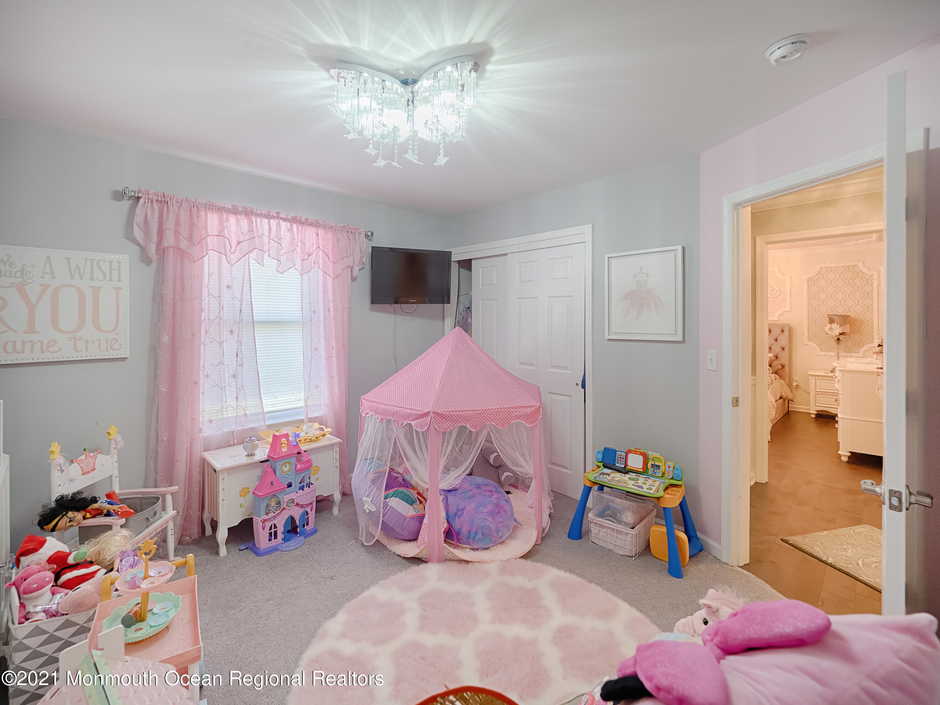 241 Privateer Road Manahawkin, NJ 08050 - Photo 42 of 44 a bedroom with a bed and a window