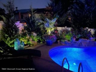 241 Privateer Road Manahawkin, NJ 08050 - Photo 8 of 44 a view of a yard with a fountain