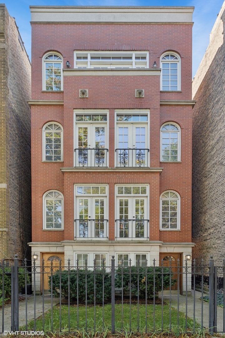 a front view of a multi story residential apartment building