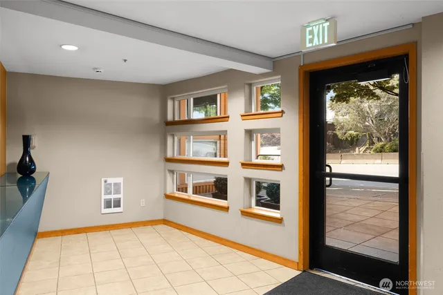 a view of an empty room with a window