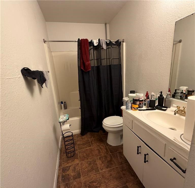 1567 Ellen Court Merced, CA 95341 - Photo 6 of 16 a bathroom with a sink toilet and shower