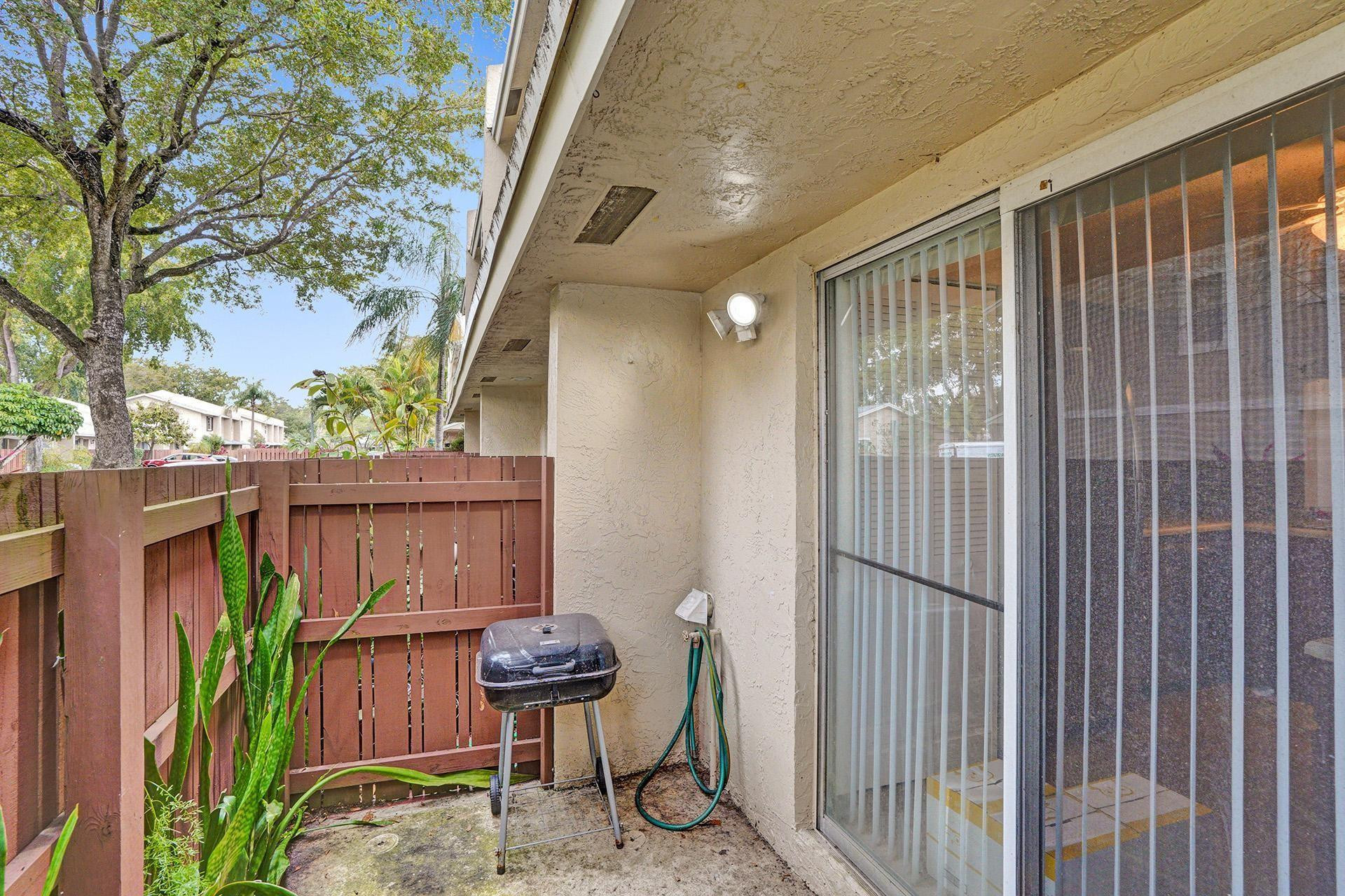 760 Banks Road Coconut Creek, FL 33063 - Photo 20 of 20 Enclosed Front Porch