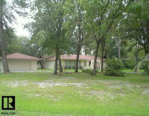 7130 Red Oak Loop New Port Richey, FL 34654 - Photo 1 of 8 Exterior Front