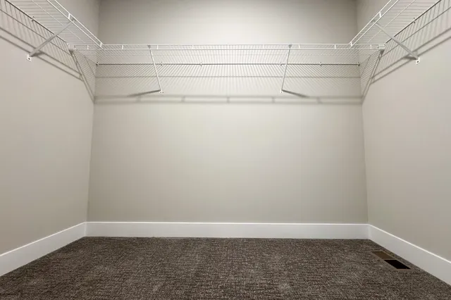 a view of a room with racks on the wall