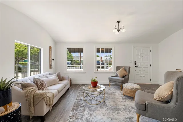 a living room with furniture or couch and a window