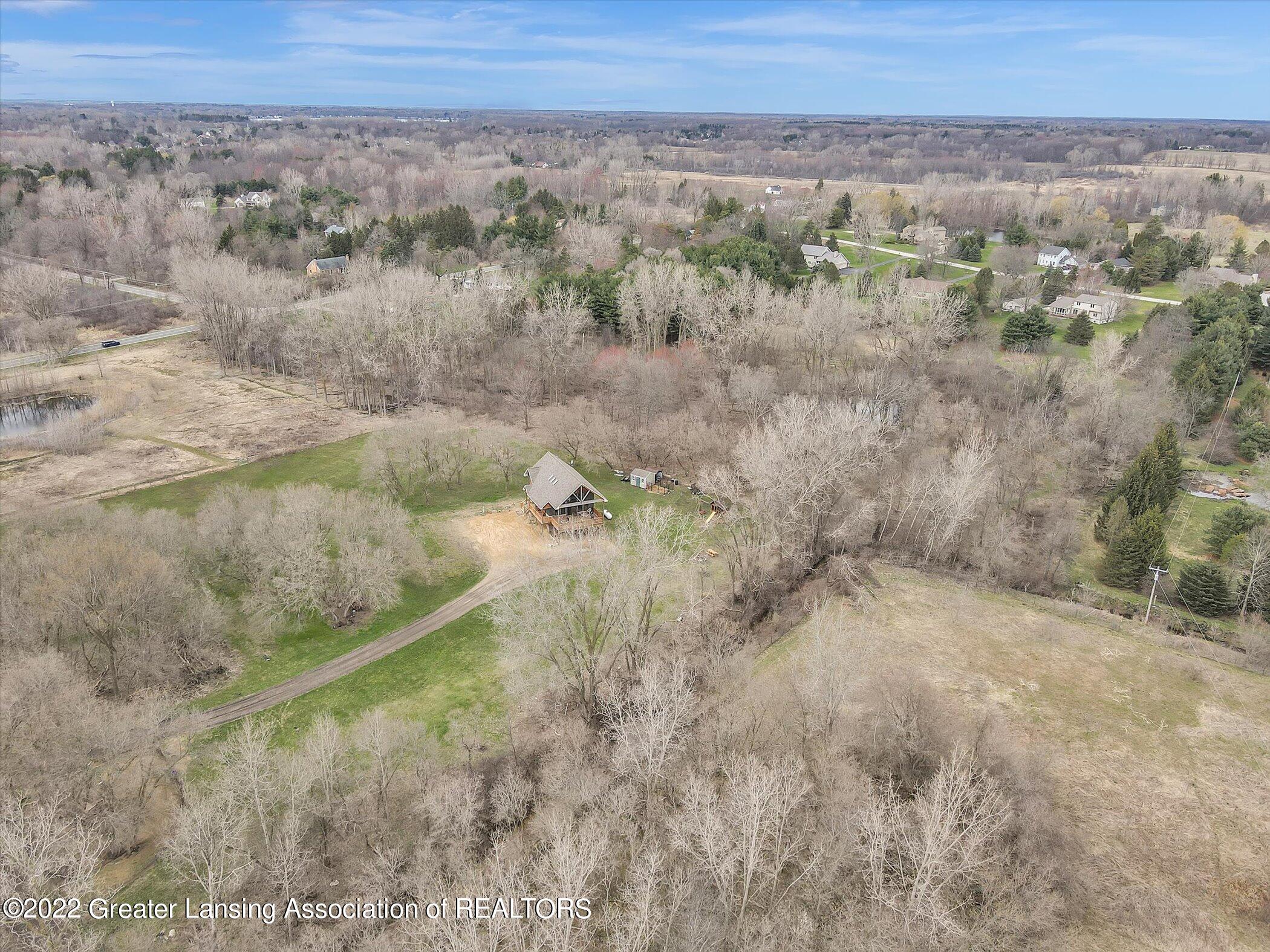 5296 Meridian Road Williamston, MI 48895 - Photo 52 of 62 56-5296-Meridian-Rd-WindowStill-Real-Est
