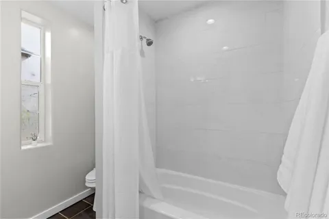 a bathroom with a bathtub
