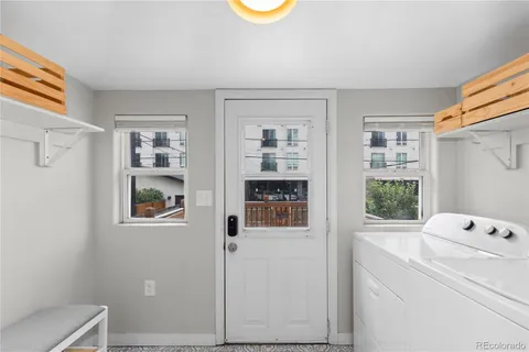 a room that has a bed and a window