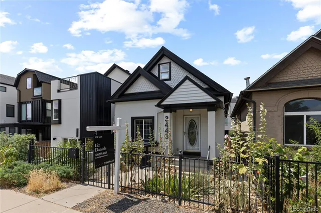 a front view of house along with street