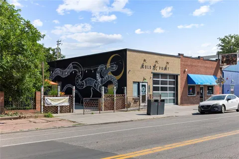 a view of a building with a street