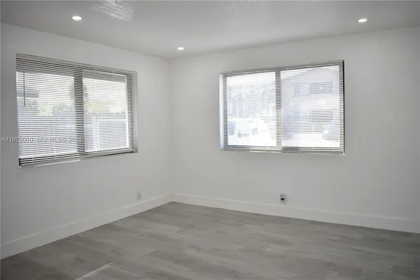 a narrow alley leading to a building