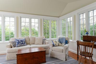 270 Stage Harbor Road Chatham, MA 02633 - Photo 13 of 25 a living room with furniture and large windows