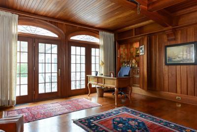 270 Stage Harbor Road Chatham, MA 02633 - Photo 16 of 25 a living room with furniture a wooden floor and a table