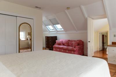 270 Stage Harbor Road Chatham, MA 02633 - Photo 19 of 25 a bedroom with a bed and a large mirror