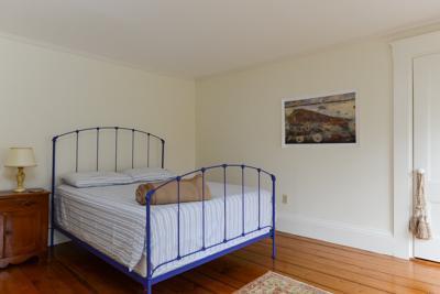 270 Stage Harbor Road Chatham, MA 02633 - Photo 23 of 25 a bedroom with a bed and a window