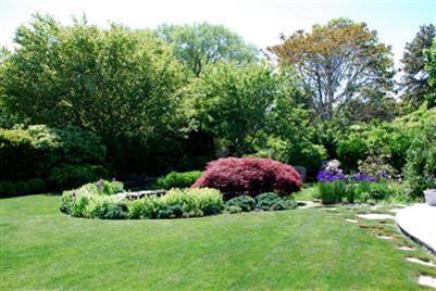 270 Stage Harbor Road Chatham, MA 02633 - Photo 24 of 25 a view of a garden with an outdoor space