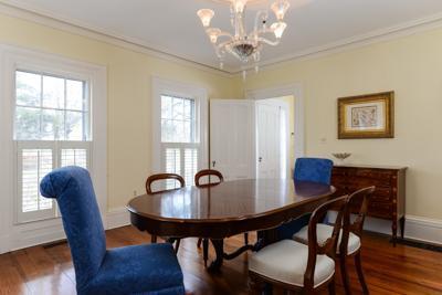 270 Stage Harbor Road Chatham, MA 02633 - Photo 6 of 25 a view of a dining room with furniture window and wooden floor