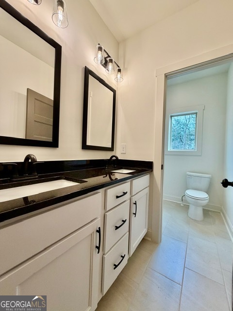 133 Kimbell Road Pine Mountain, GA 31822 - Photo 11 of 17 a bathroom with double sink and a mirror