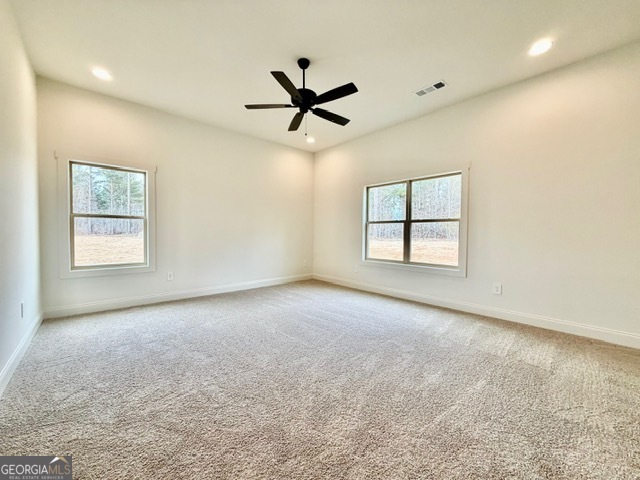 133 Kimbell Road Pine Mountain, GA 31822 - Photo 14 of 17 an empty room with windows and fan