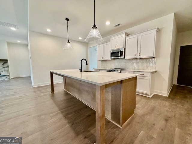 133 Kimbell Road Pine Mountain, GA 31822 - Photo 5 of 17 a kitchen with a sink a counter top space stainless steel appliances and cabinets