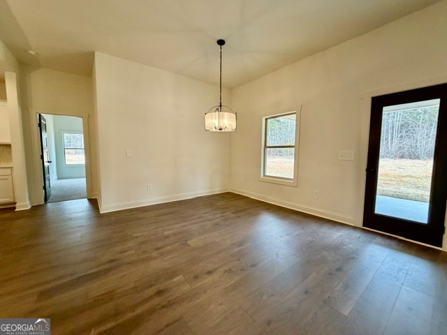 133 Kimbell Road Pine Mountain, GA 31822 - Photo 6 of 17 a view of an empty room with window and wooden floor