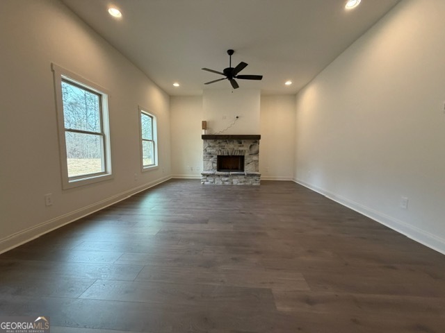 133 Kimbell Road Pine Mountain, GA 31822 - Photo 8 of 17 an empty room with windows and fireplace