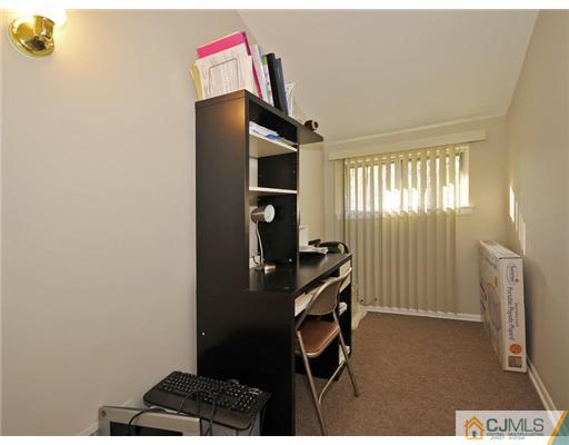 45 Rock Hill Road Old Bridge, NJ 08857 - Photo 12 of 14 a room with furniture and a window
