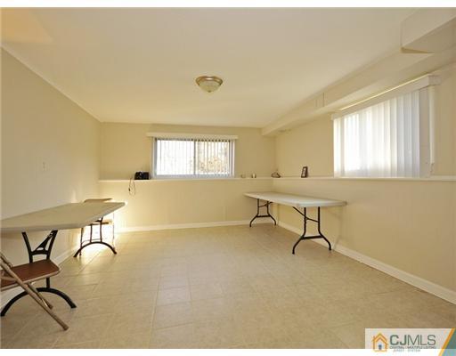 45 Rock Hill Road Old Bridge, NJ 08857 - Photo 6 of 14 a living room with a window and furniture