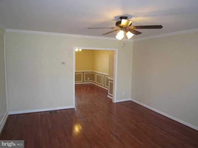 1725 Pin Oak Road Parkville, MD 21234 - Photo 4 of 18 a view of a livingroom with wooden floor