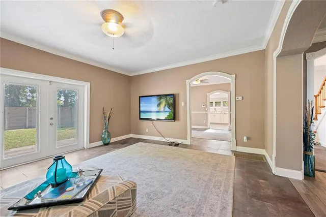 a living room with a couch and a flat screen tv
