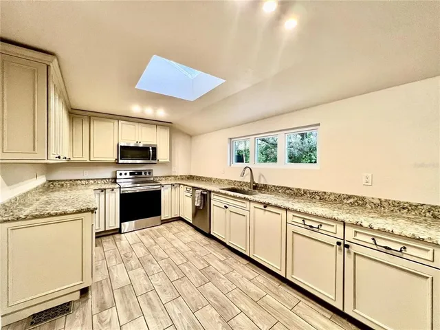 a view of entryway with a front door