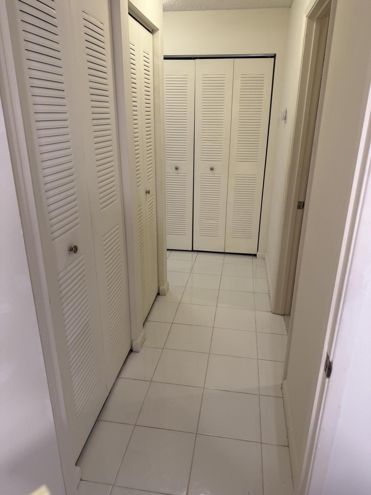 18528 Hidden Way Boca Raton, FL 33496 - Photo 21 of 37 GUEST HALLWAY