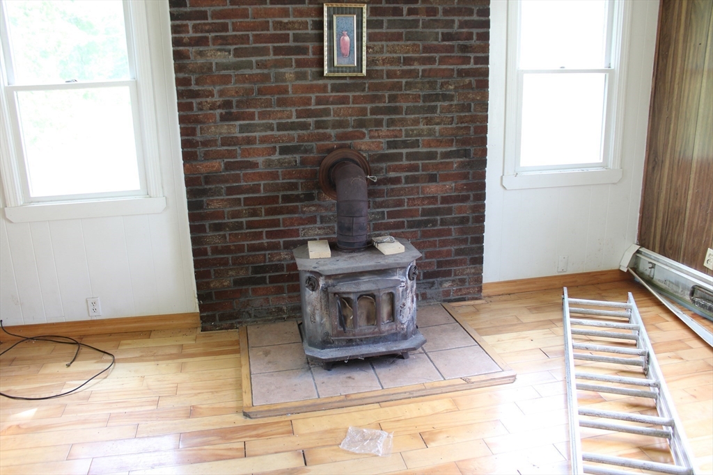 3 Ledge Street Sutton, MA 01590 - Photo 11 of 12 a view of a door with wooden floor